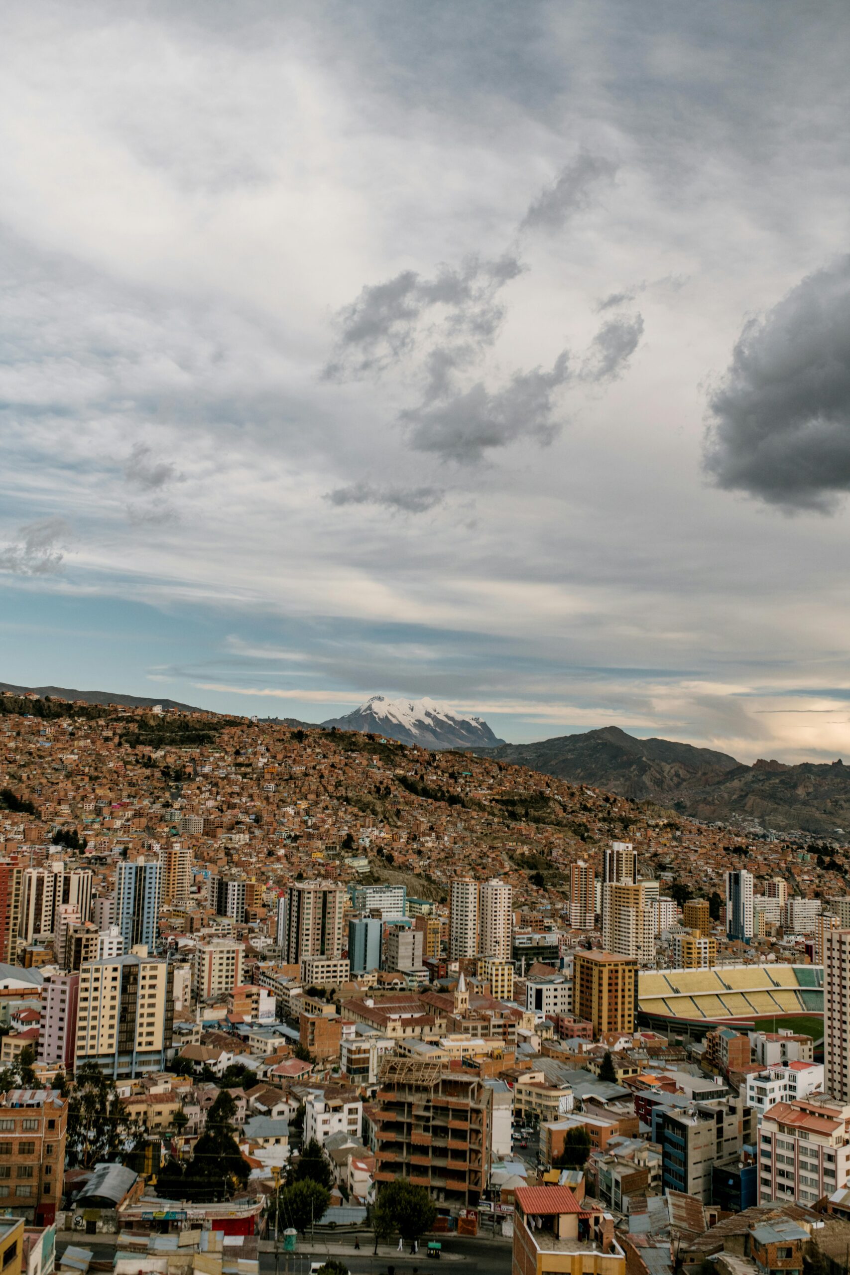 City Buildings Under Cloudy Sky